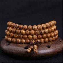 Load image into Gallery viewer, Multicouche 108 perles de bois Lotus OM Bracelet